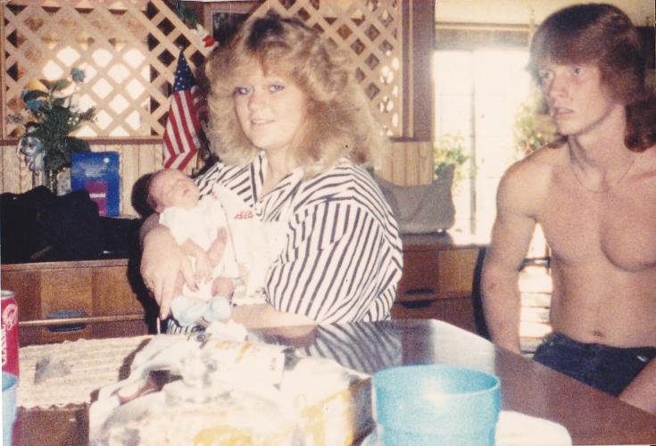 Mom me and uncle mike the day she brought me home from the hospital when I was born